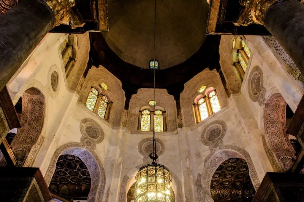 Symmetrical main hall inside the mausoleum of the Sultan al-Ghuri Complex with marble flooring and stone walls, Sultan al-Ghuri Mausoleum, Cairo