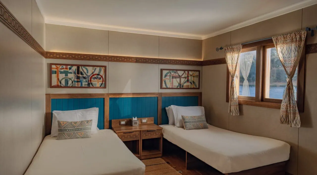Double bedroom on Nuut or Nuun Dahabiya with soft lighting