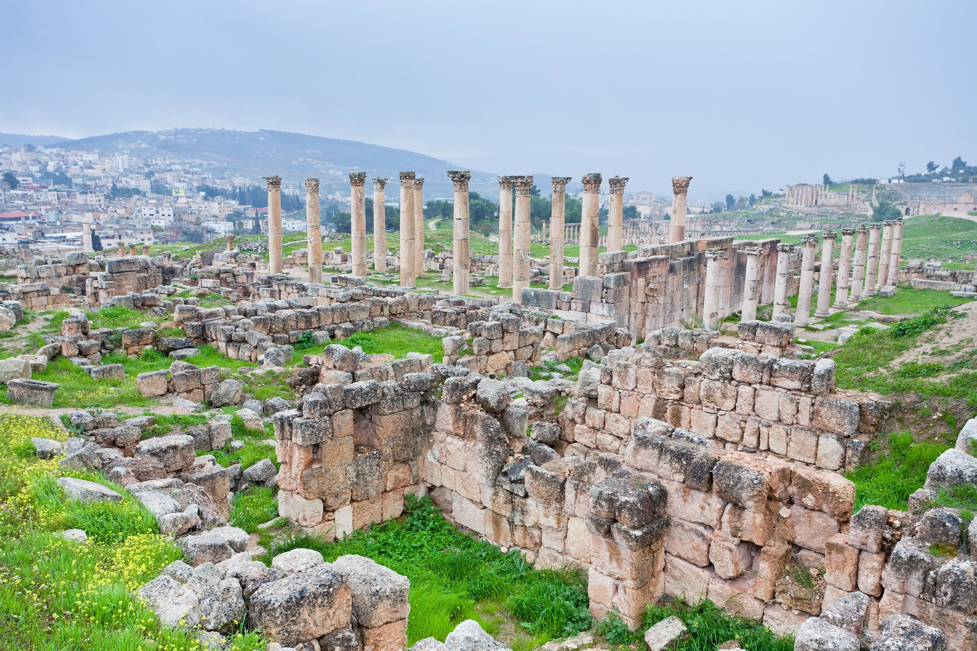 Ancient Roman columns and ruins at the archaeological site of Jerash, Jordan