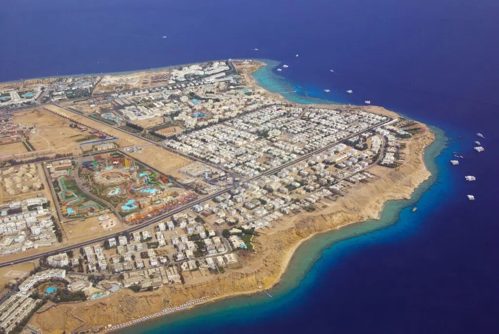 Aerial view of coral reefs in the clear Red Sea waters along the coast, Sharm El Sheikh