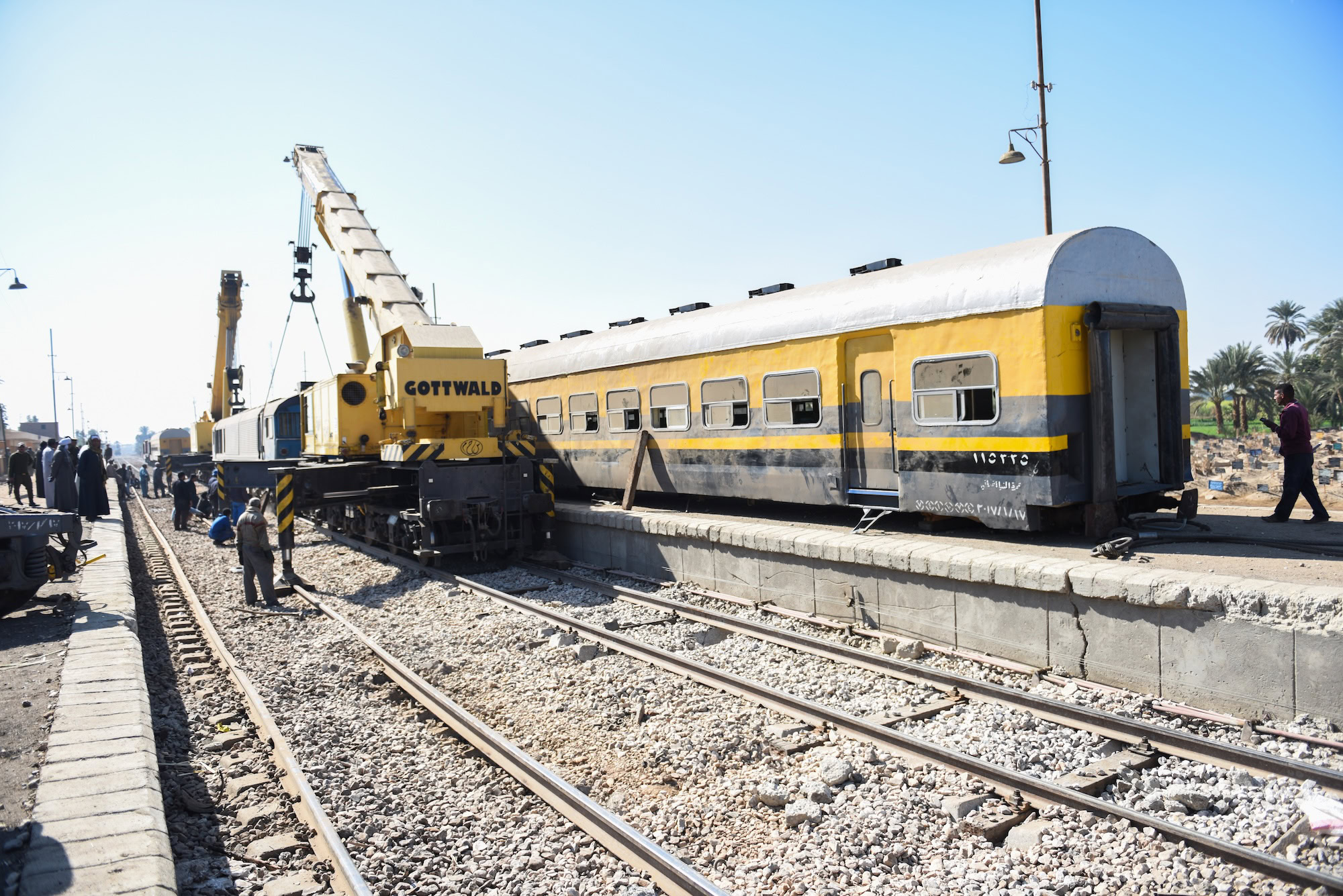 Train locomotive at Egyptian railway station with platform and tracks