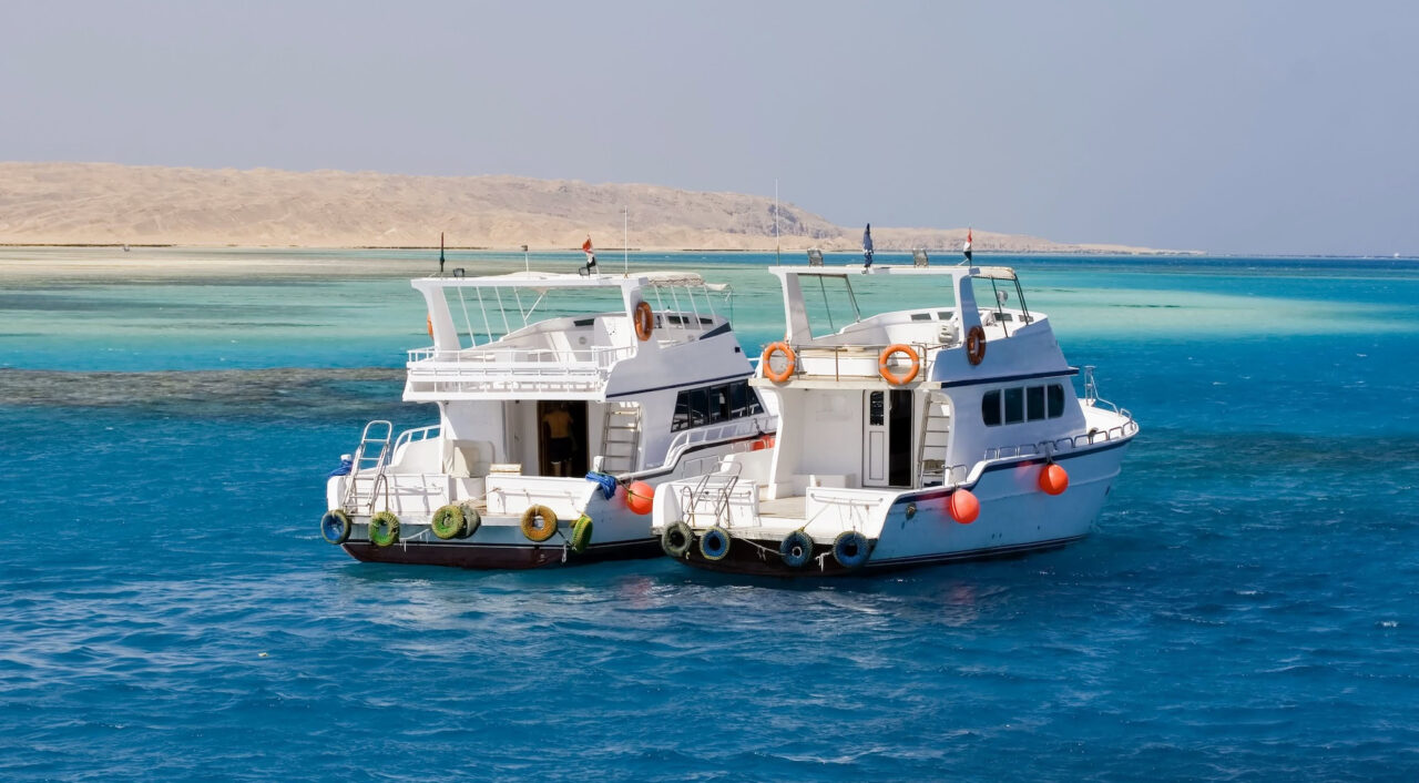 Two Yachts Anchored Outside Giftin Island In The Red Sea