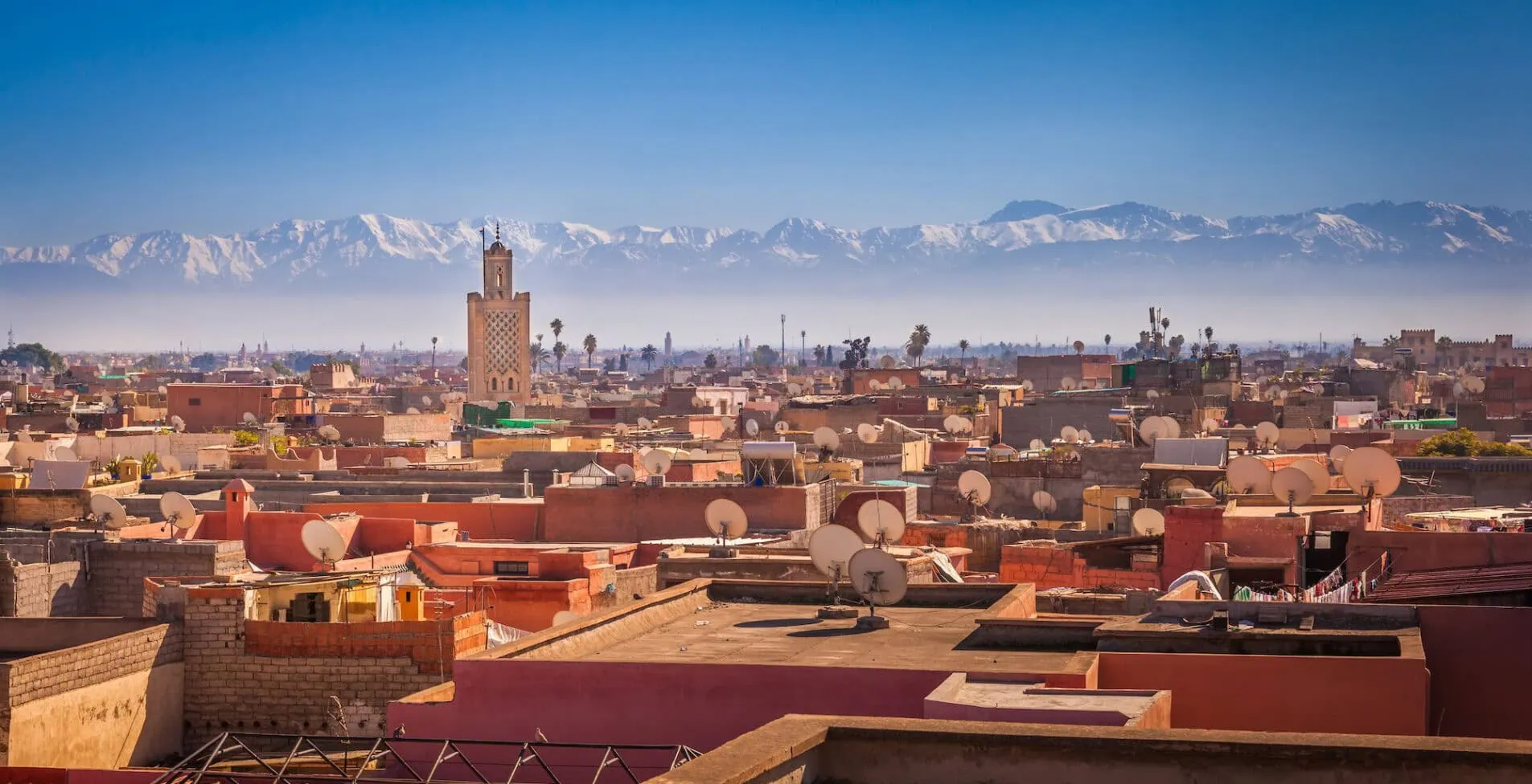 Panoramic view of Marrakesh and the snow capped Atlas mountains 1905x976 crop 48 49