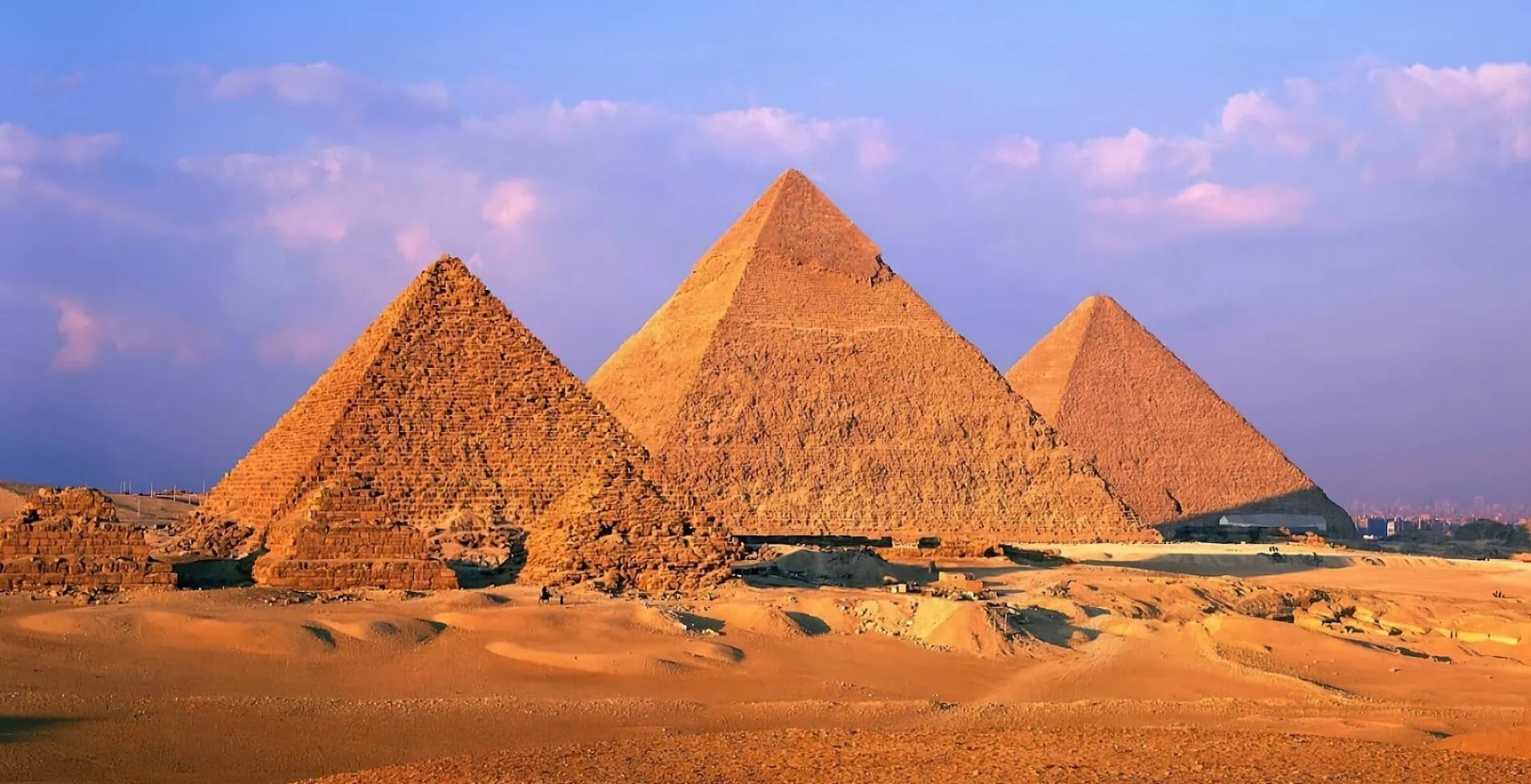 A breathtaking view of the Egyptian Pyramids of Giza 1905x976 crop 56 39