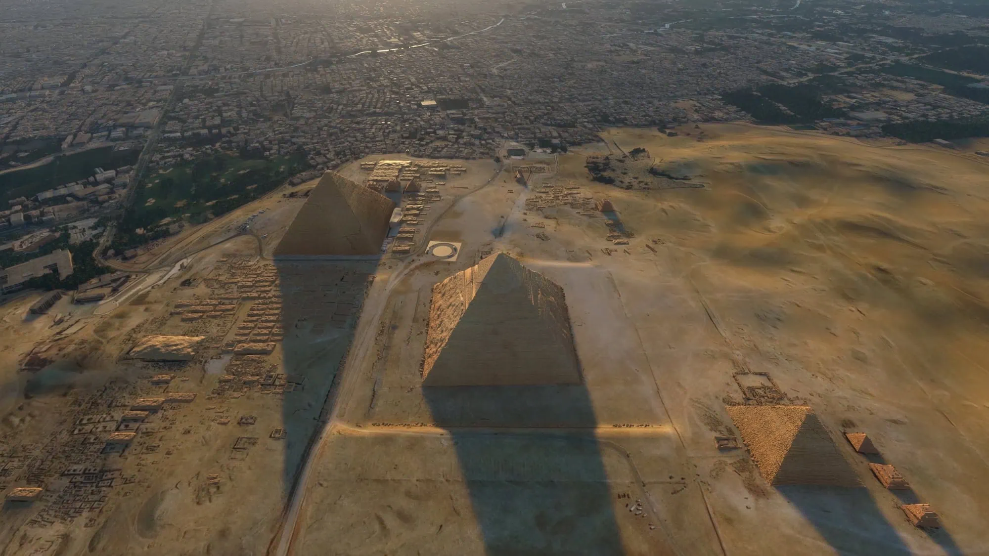Aerial view of the Great Pyramid of Giza showing surrounding roads and urban development