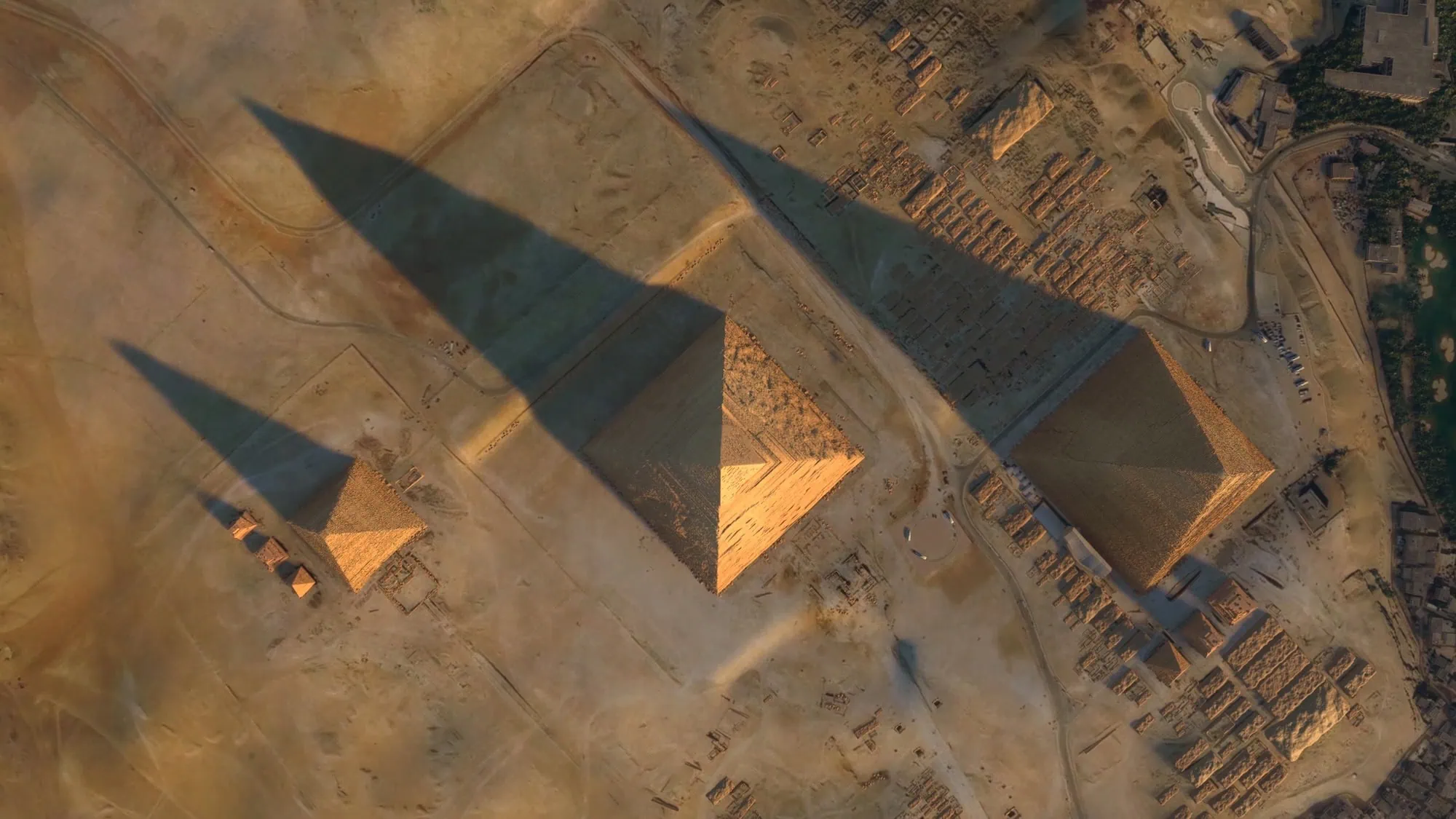 Aerial view of the Giza Pyramid Complex showing the ancient pyramids and desert landscape