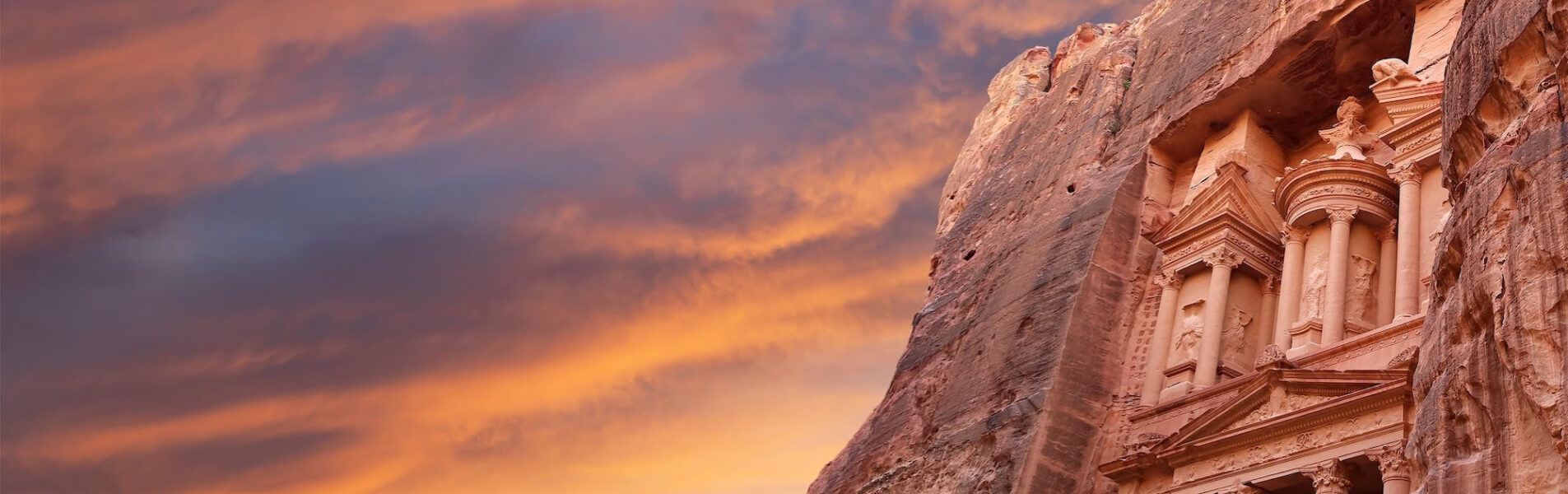 Al Khazneh or The Treasury (against the background of a beautiful sky with clouds). Petra, Jordan-- it is a symbol of Jordan, as well as Jordan's most-visited tourist attraction-1
