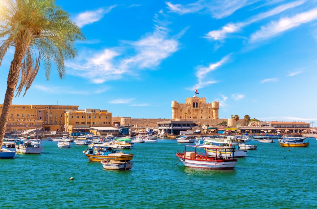 Boats anchored near Qaitbay Citadel at Alexandria Harbour along the Mediterranean coast, Alexandria