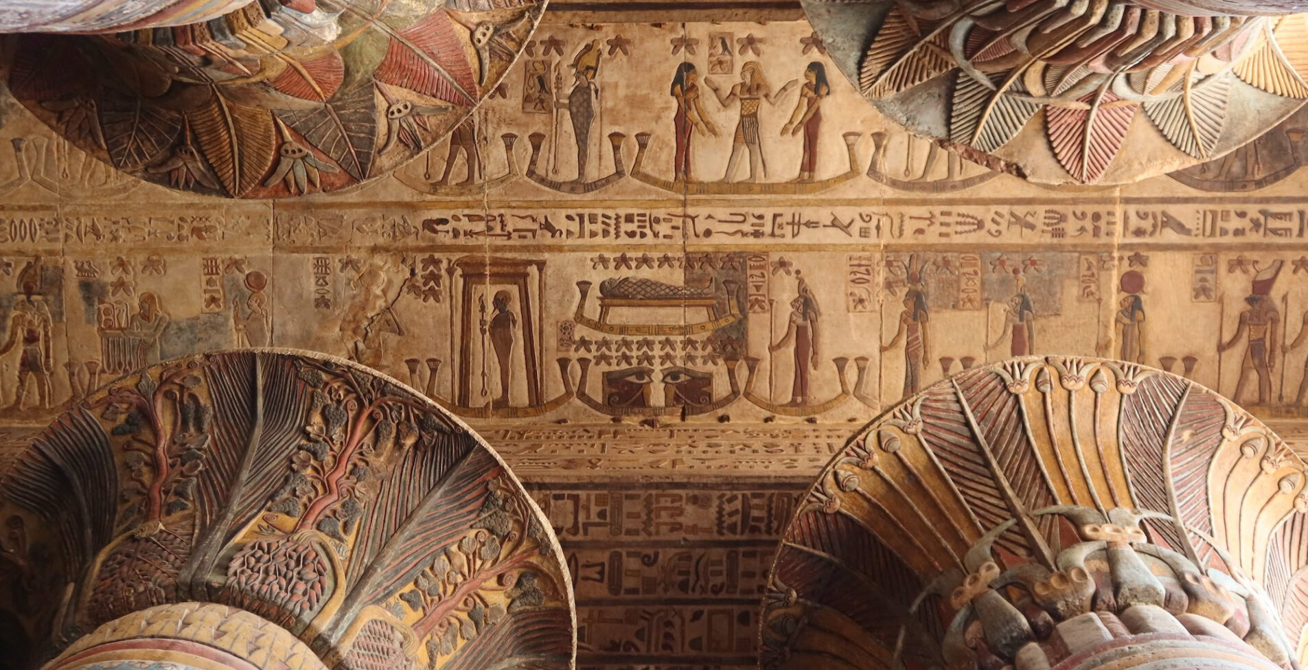 Beautiful colorful inscriptions on the walls and ceiling of Khunum temple in Esna in Luxor
