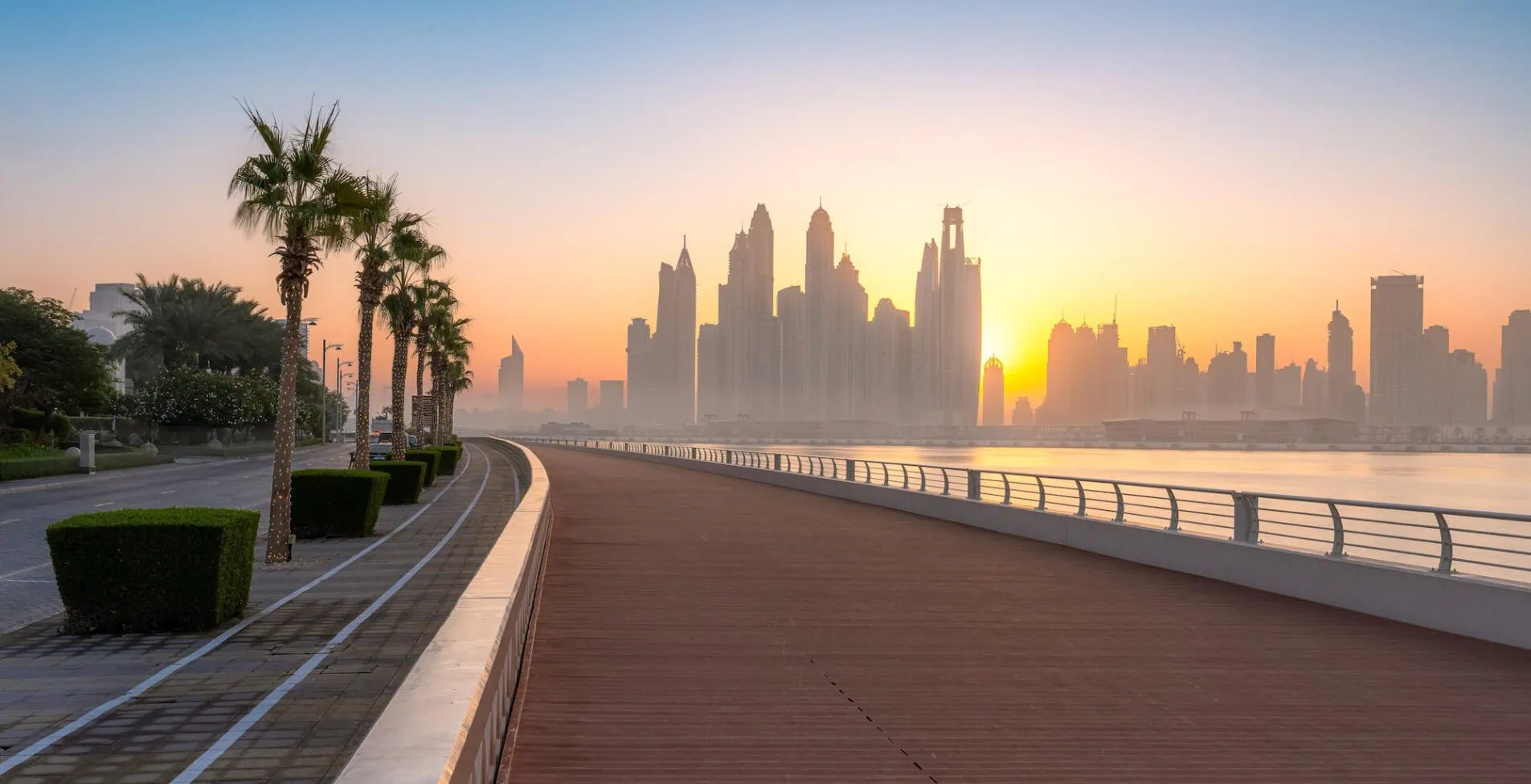 Boardwalk in the morning of Dubai Palm at sunrise 1905x976 crop 52 38