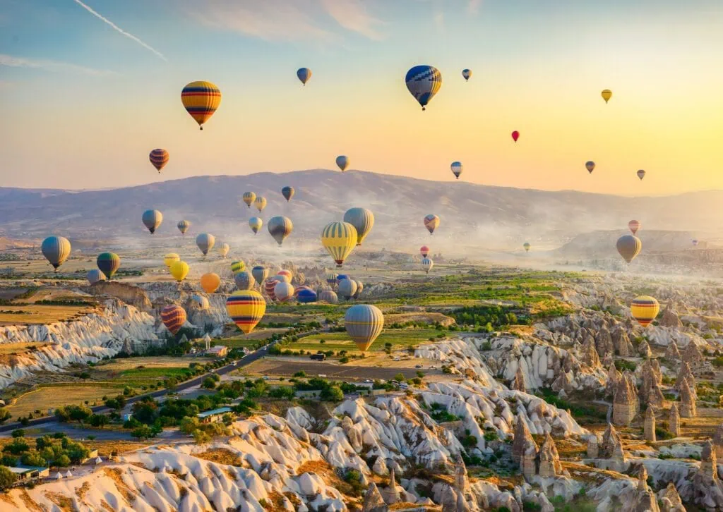 A grand tour can hold both of the world's great balloon skies: Luxor over temples, and Cappadocia over a valley of rock spires carved by wind and time.