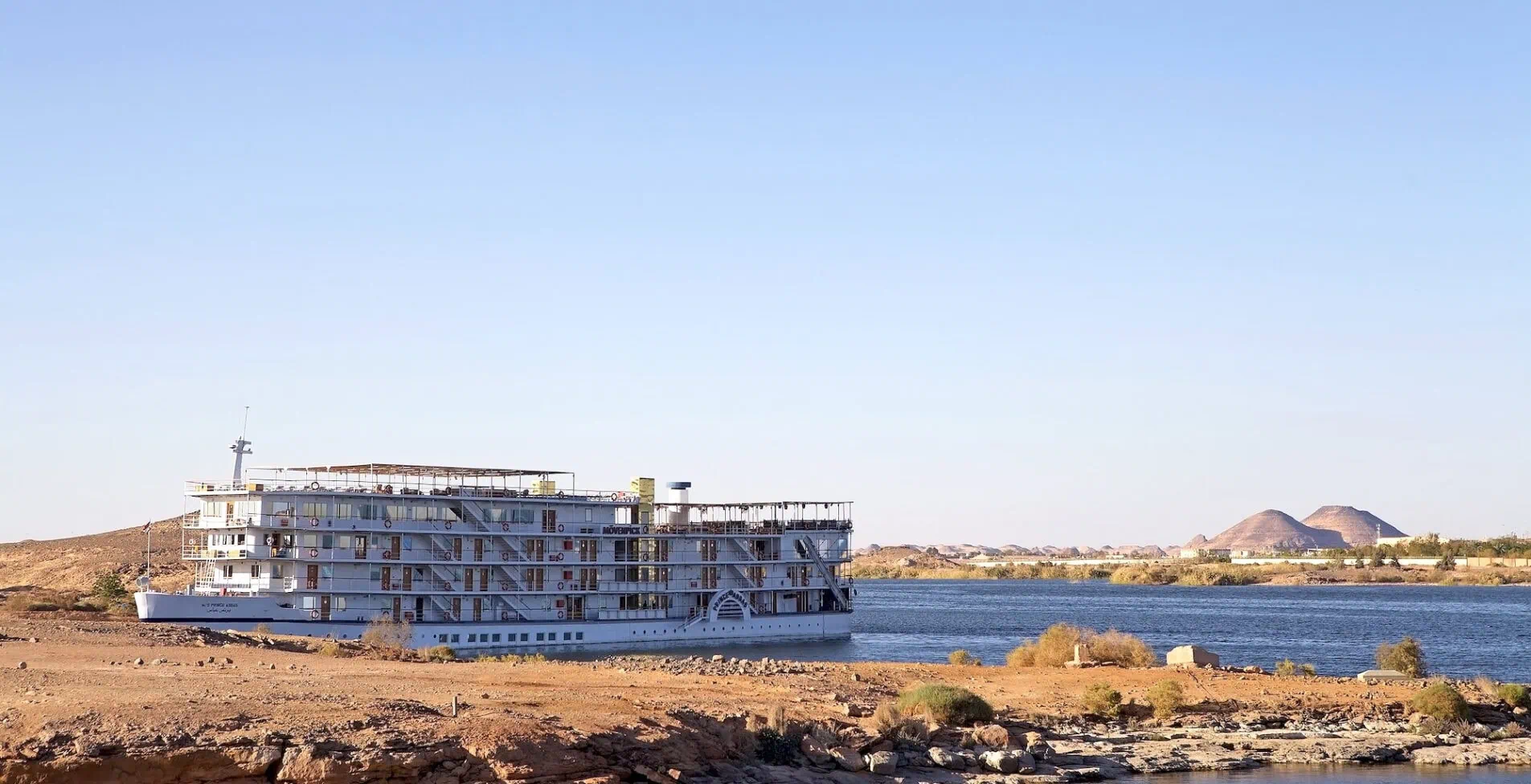 Lake Nasser cruise from Abu Simbel to Aswan Egypt. Movenpick Prince Abbas ship at Abu Simbel 1905x976 crop 52 74