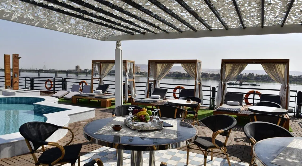 Sun deck on MS Mayfair with loungers and umbrellas