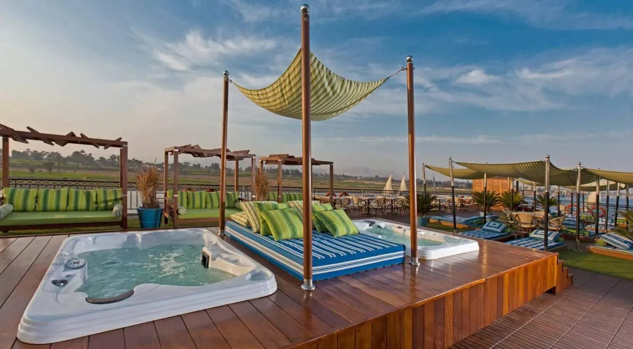 Outdoor pool on MS Mayfair sun deck with river view