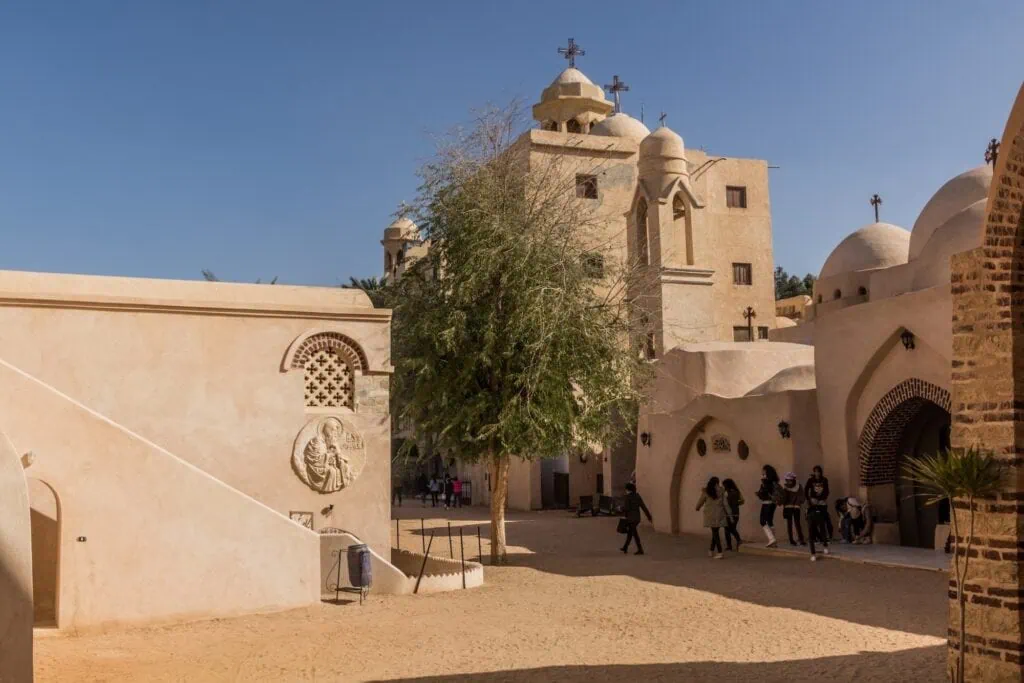 The Monastery of Saint Mary El-Sourian with its stone walls and church buildings in Wadi El Natrun, Wadi El Natrun