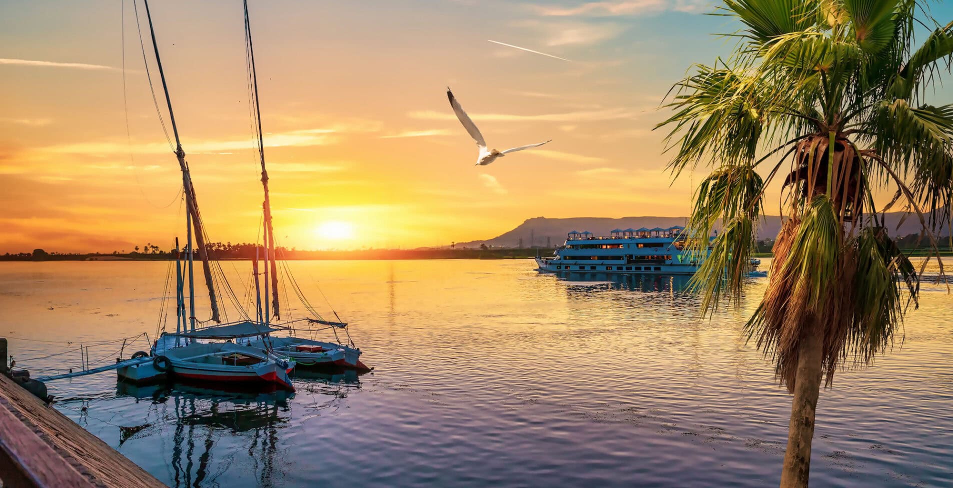 Nile River and boats at sunset in Luxor 1905x976 crop 52 58