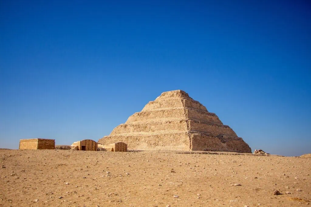 Step Pyramid of Djoser rising above the desert plateau at the Saqqara Necropolis, Saqqara
