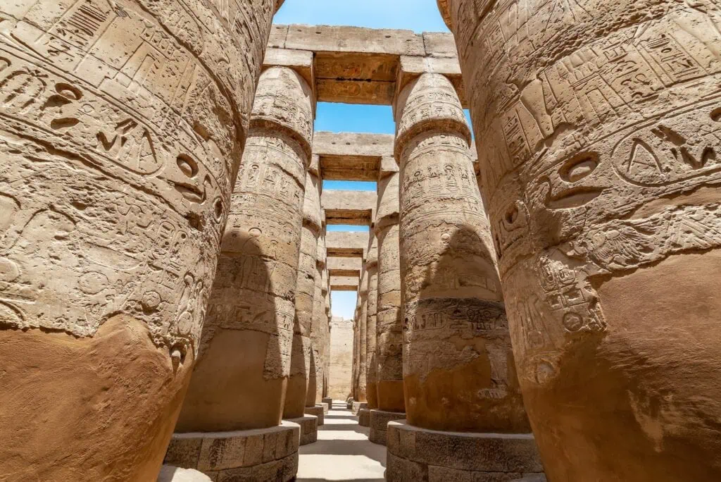 Rows of massive columns in Karnak temple in Luxor Egypt