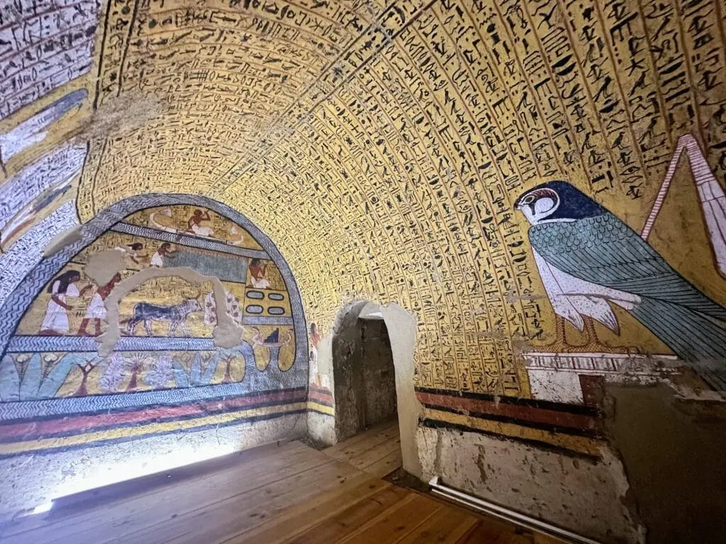 Colorful hieroglyphs and wall paintings inside the Tomb of Sennutem