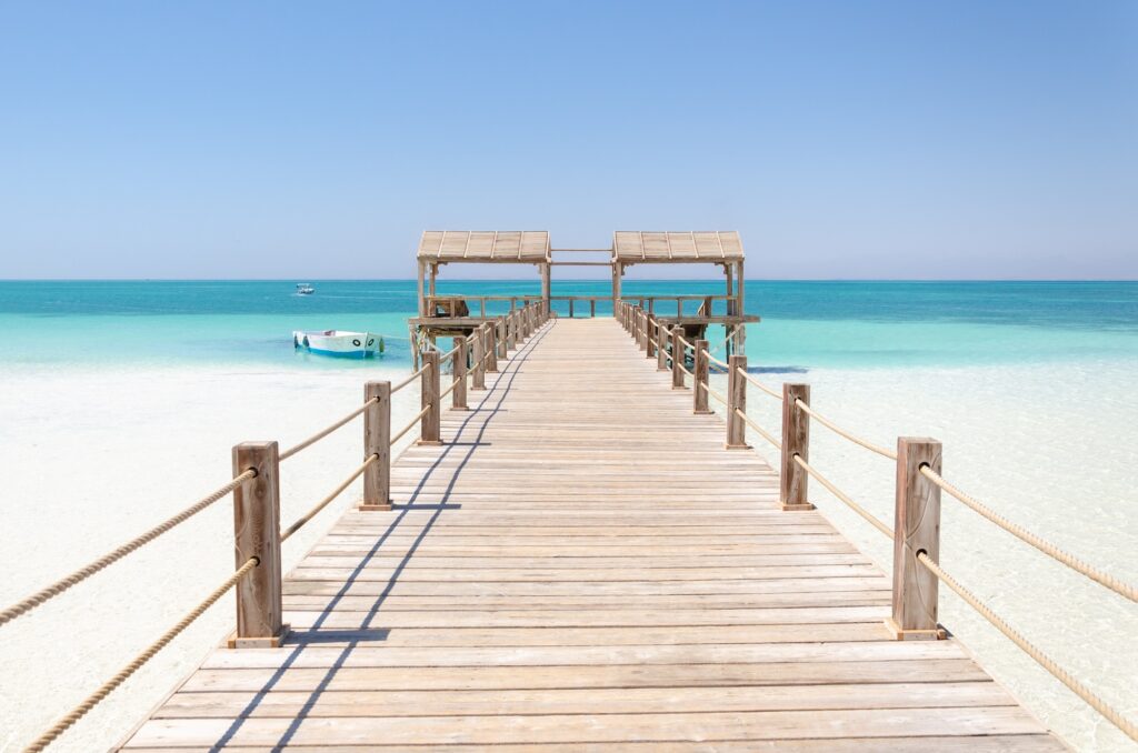 Wooden pier in Giftun island Hurghada Red Sea Egypt. Vacation and Holiday concept