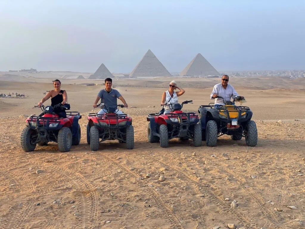 A group of quad bikes in front of the Giza Pyramids, Giza