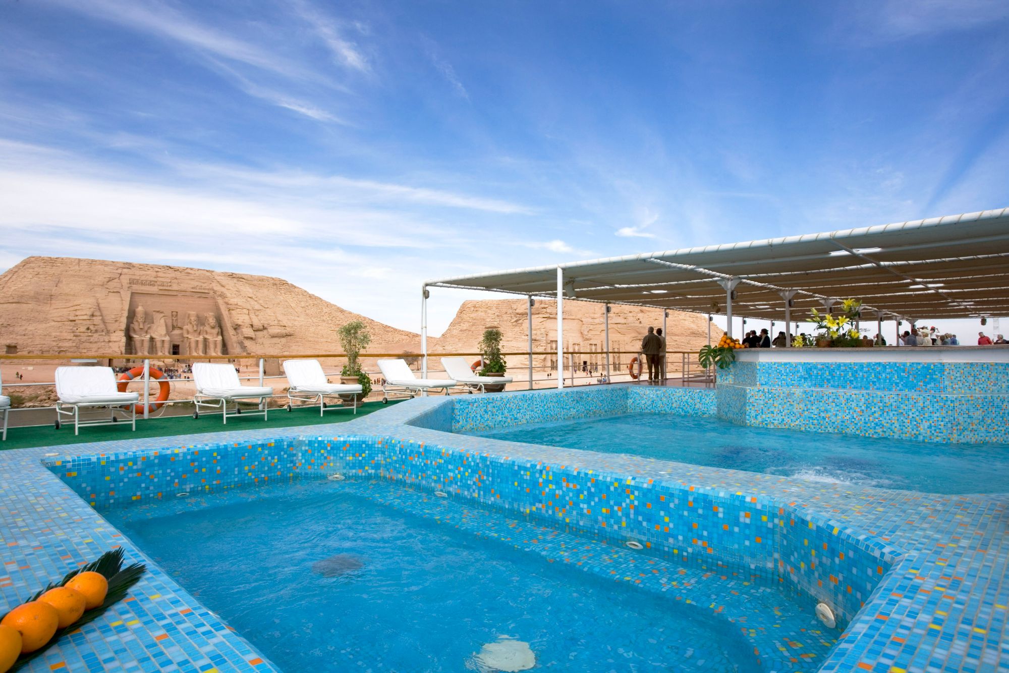 Outdoor pool on Mövenpick Prince Abbas with Abu Simbel view