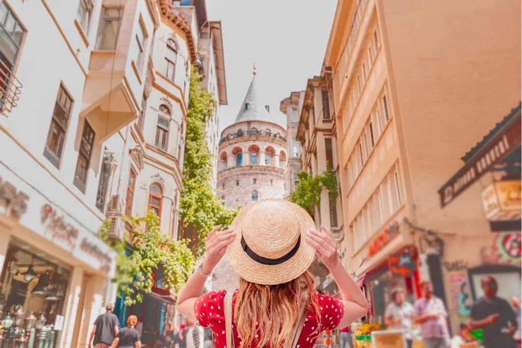 Galata Tower rising above surrounding buildings near the waterfront Istanbul