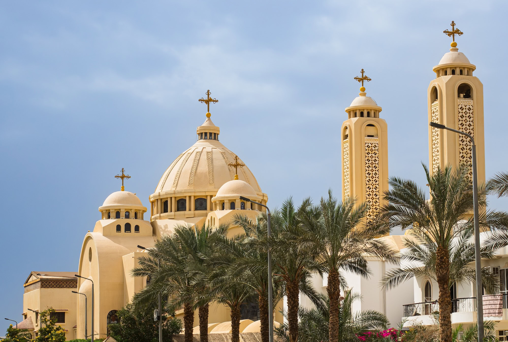 Coptic Orthodox Cathedral in Egypt with distinctive domes and crosses