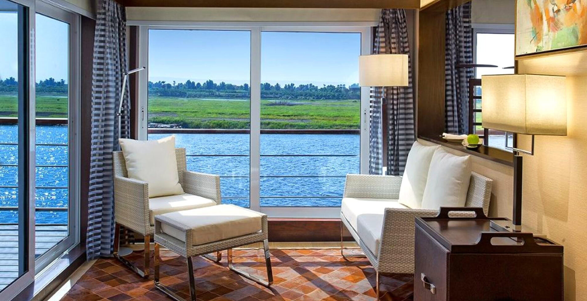 Oberoi Philae suite sitting area with Nile River view 1905x976 crop y81