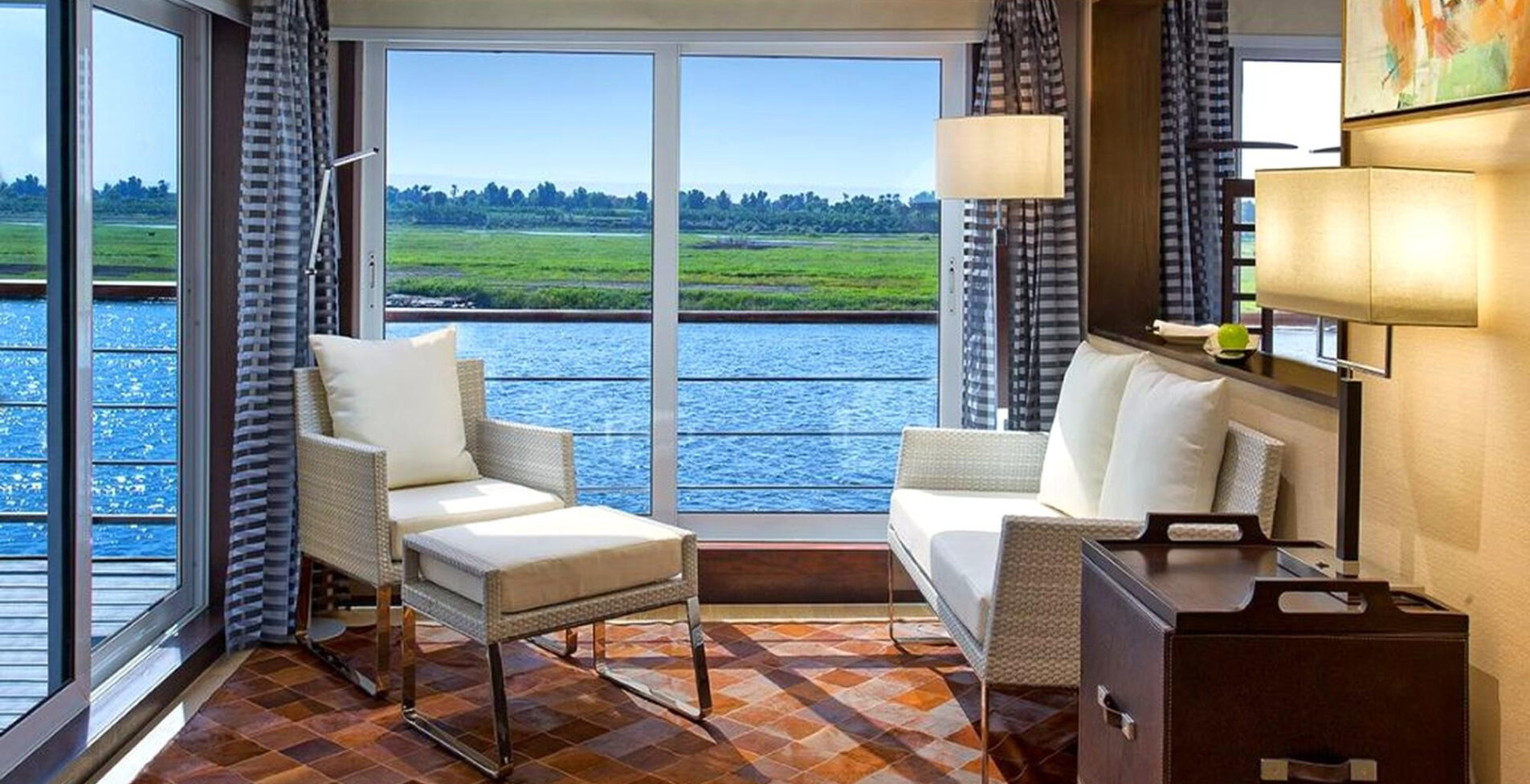 Oberoi Philae suite sitting area with Nile River view 1905x976 crop y88
