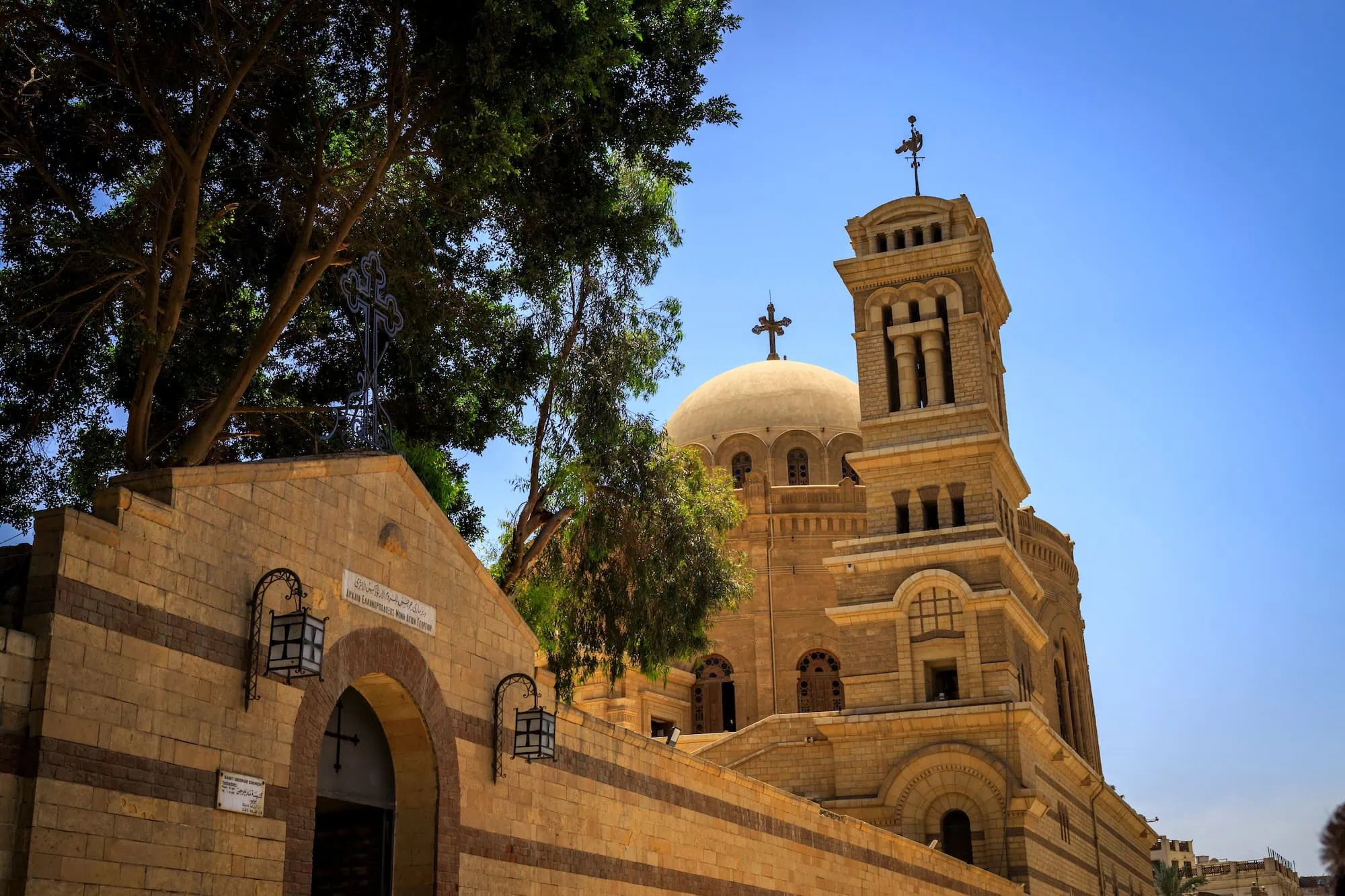 Coptic Orthodox Church in Cairo with dome, bell tower, and stone architecture