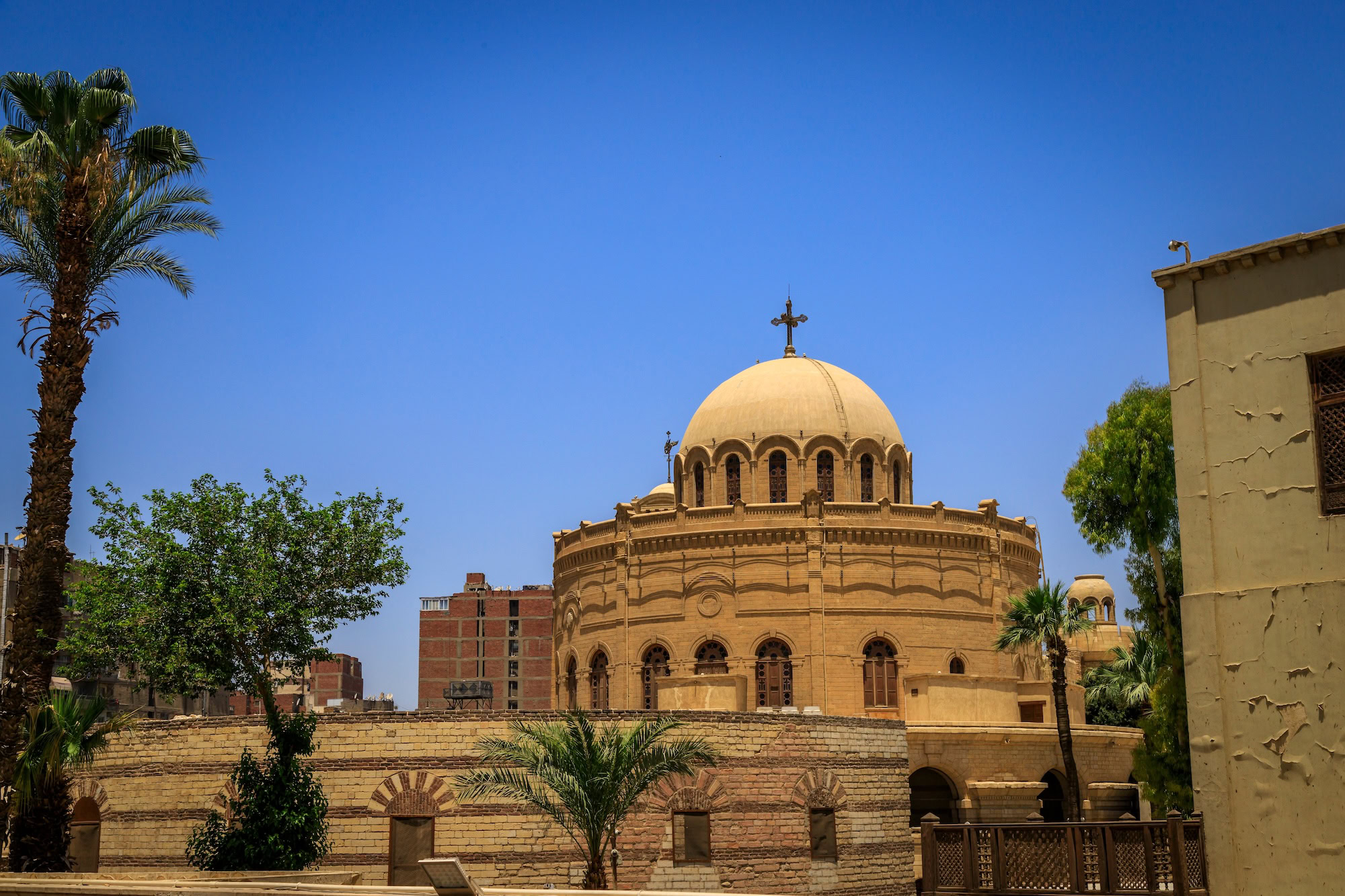 Ancient Coptic Orthodox Church in Cairo with stone domes and crosses