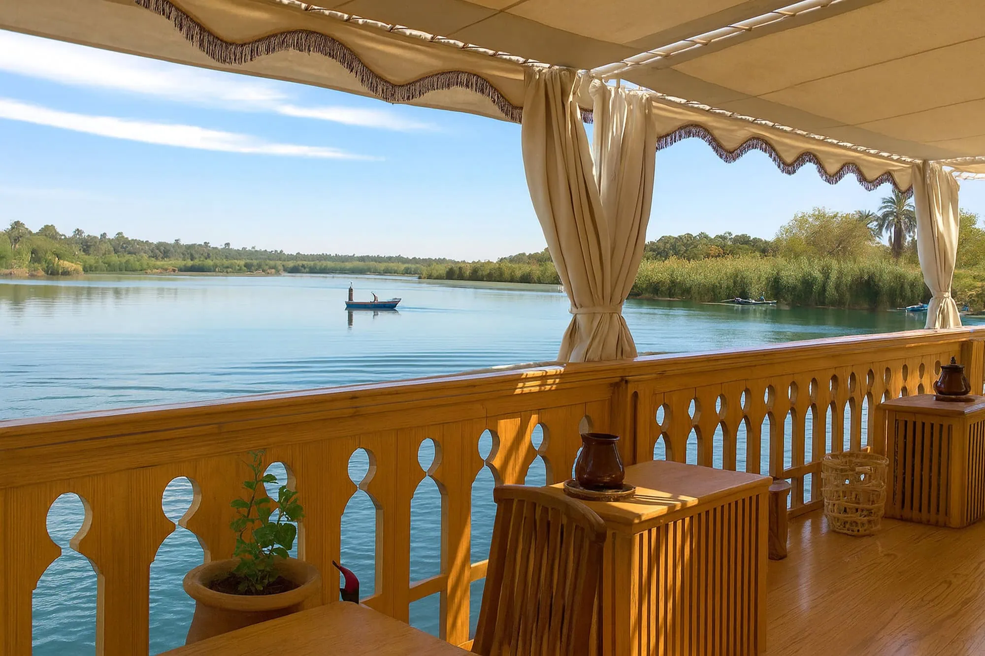 Luxury Nile River cruise boat deck with elegant furnishings and river views