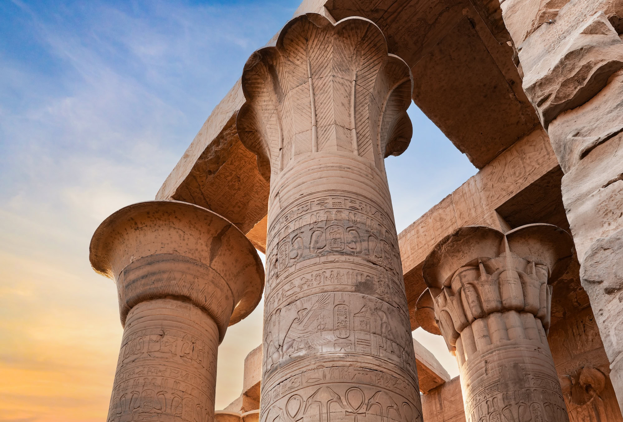 Ancient Egyptian columns with hieroglyphics at Karnak Temple in Luxor
