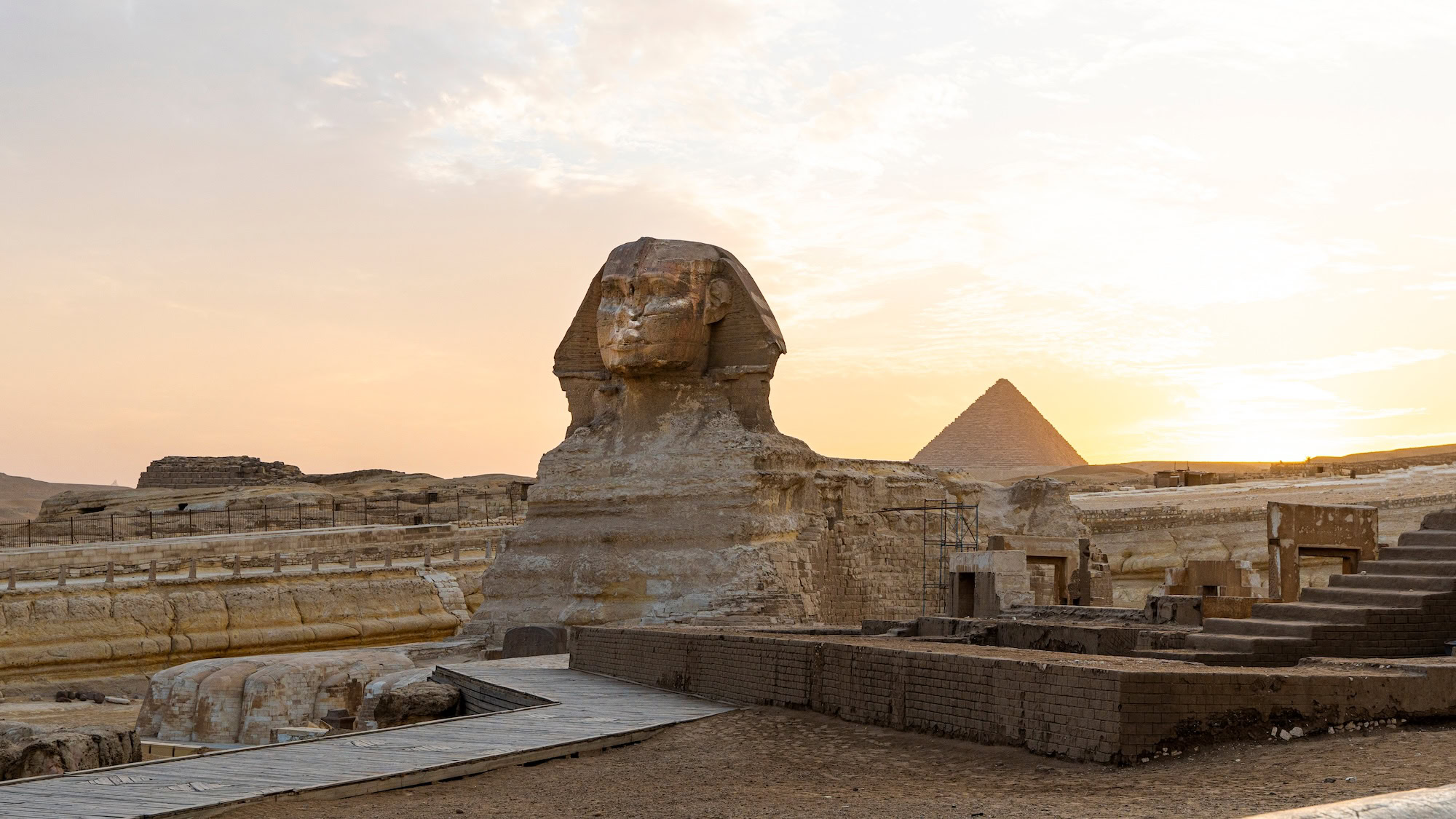The Great Sphinx of Giza with the Great Pyramid in the background