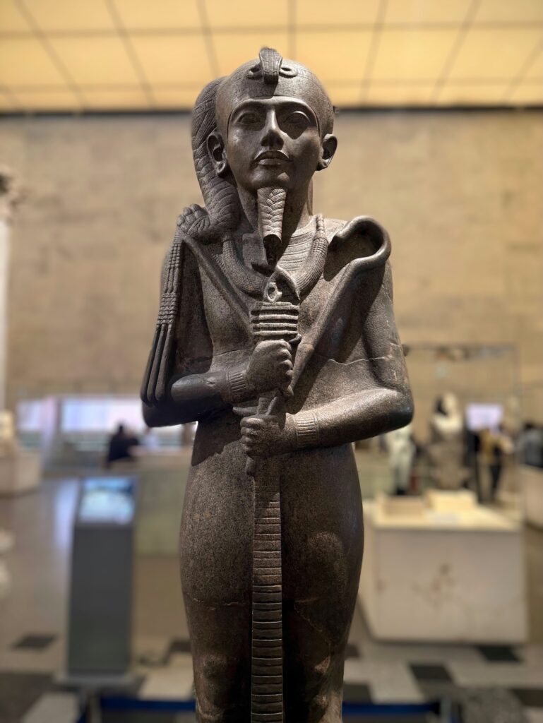 Statue of the god Khonsu displayed at the National Museum of Egyptian Civilization