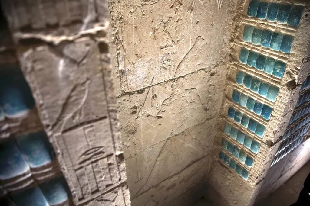 Carvings and blue faience tiles in Djoser’s underground chamber