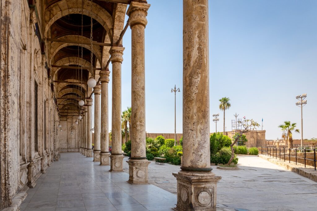 Courtyard portico with white alabaster walls and columns at the Muhammad Ali Mosque within the Cairo Citadel, Cairo