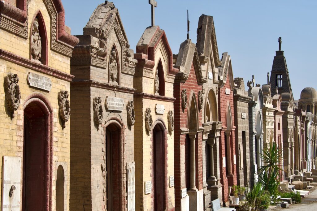 A view of stone mausoleums and crosses within Saint George’s Coptic Christian Cemetery in the Historic Cairo area, Cairo