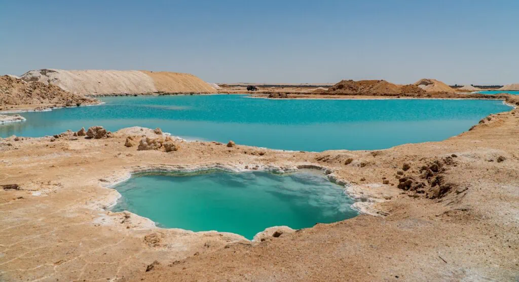 Turquoise salt lakes with crystallized salt edges, Salt Lakes, Siwa Oasis