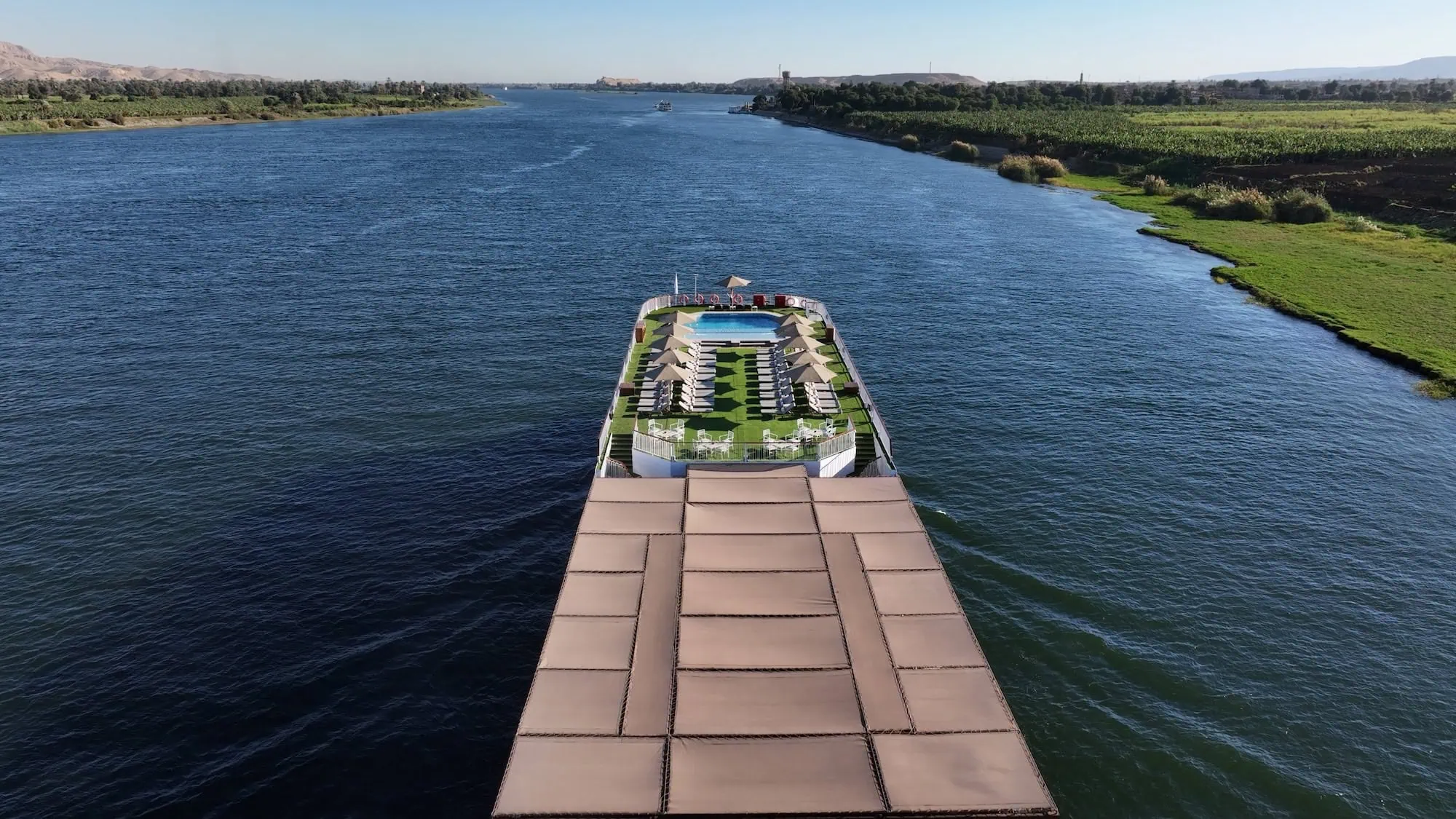 Aerial view of luxury Nile cruise ship sailing on the Nile River in Egypt