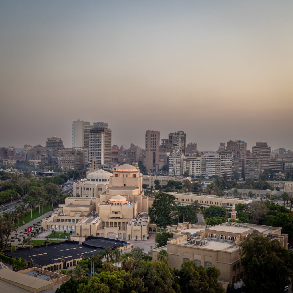 Aerial view of the Cairo Opera House at sunset with surrounding cultural complex and Nile-adjacent setting, Cairo Opera House, Cairo