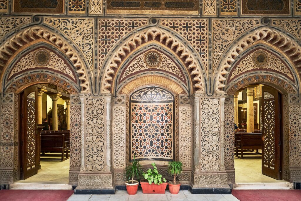 Interior view of the Hanging Church with wooden ceiling, icons, and carved columns inside Saint Virgin Mary’s Coptic Orthodox Church, Coptic Cairo, Cairo