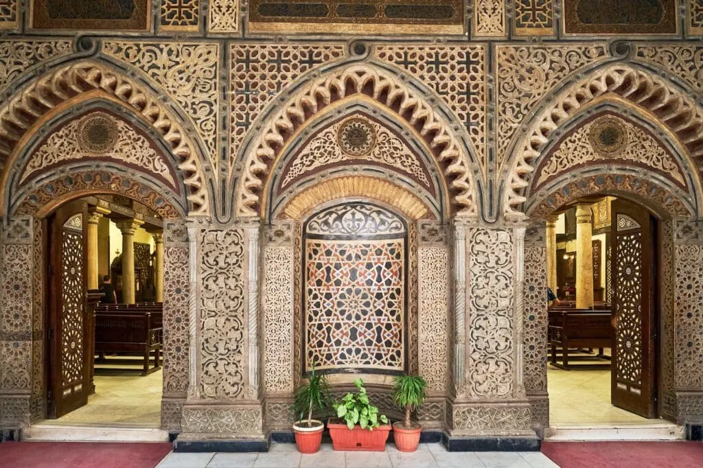 Interior view of the Hanging Church with wooden ceiling, icons, and carved columns inside Saint Virgin Mary’s Coptic Orthodox Church, Coptic Cairo, Cairo