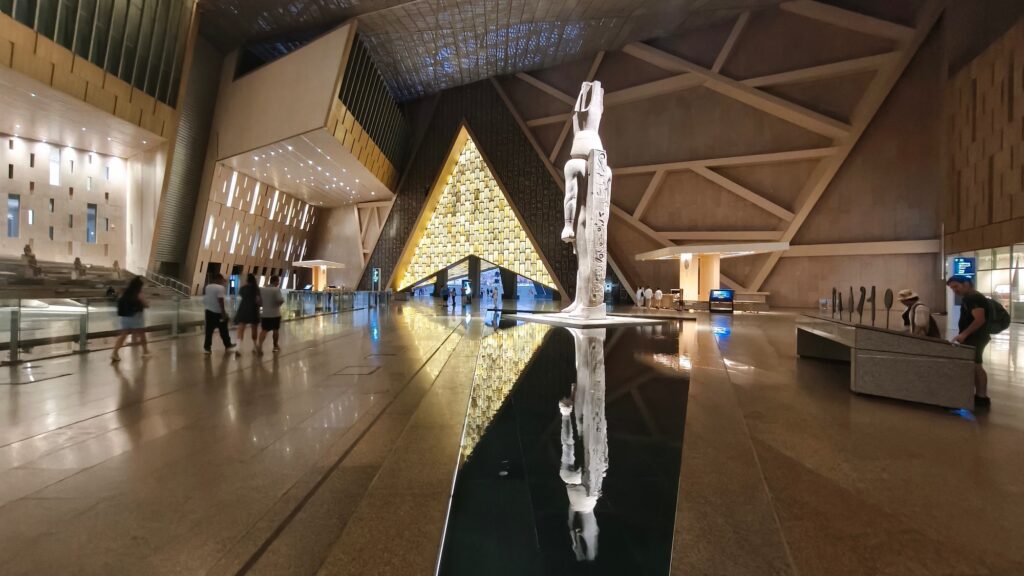 Interior view of the Grand Egyptian Museum entrance hall featuring the expansive atrium and central statue display, Grand Egyptian Museum, Giza