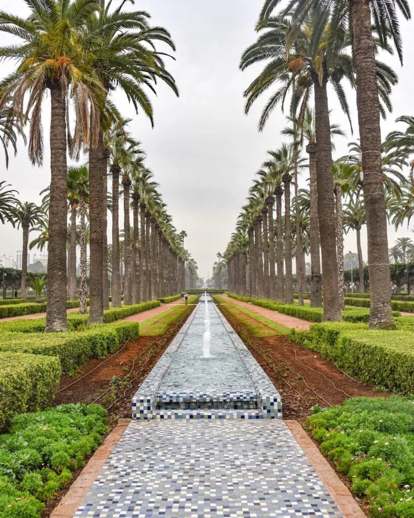 League Park with green lawns, walking paths, and surrounding urban buildings, Casablanca