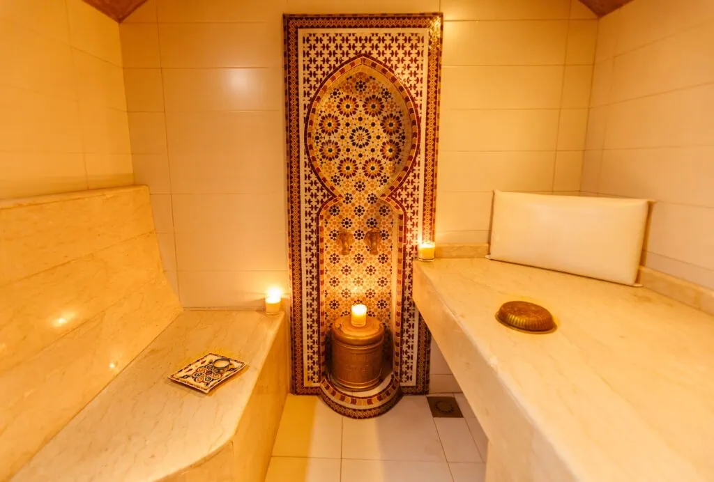 Traditional Moroccan Hammam with tiled walls and geometric patterns, Marrakesh