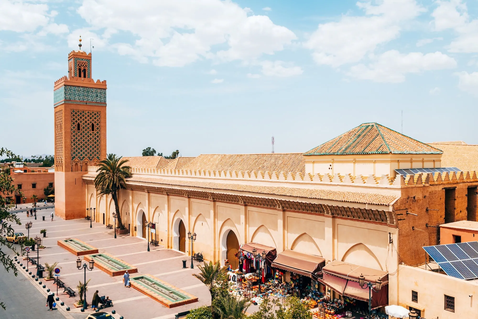 Panoramic view of Marrakech's Old Medina with traditional Islamic architecture and market stalls